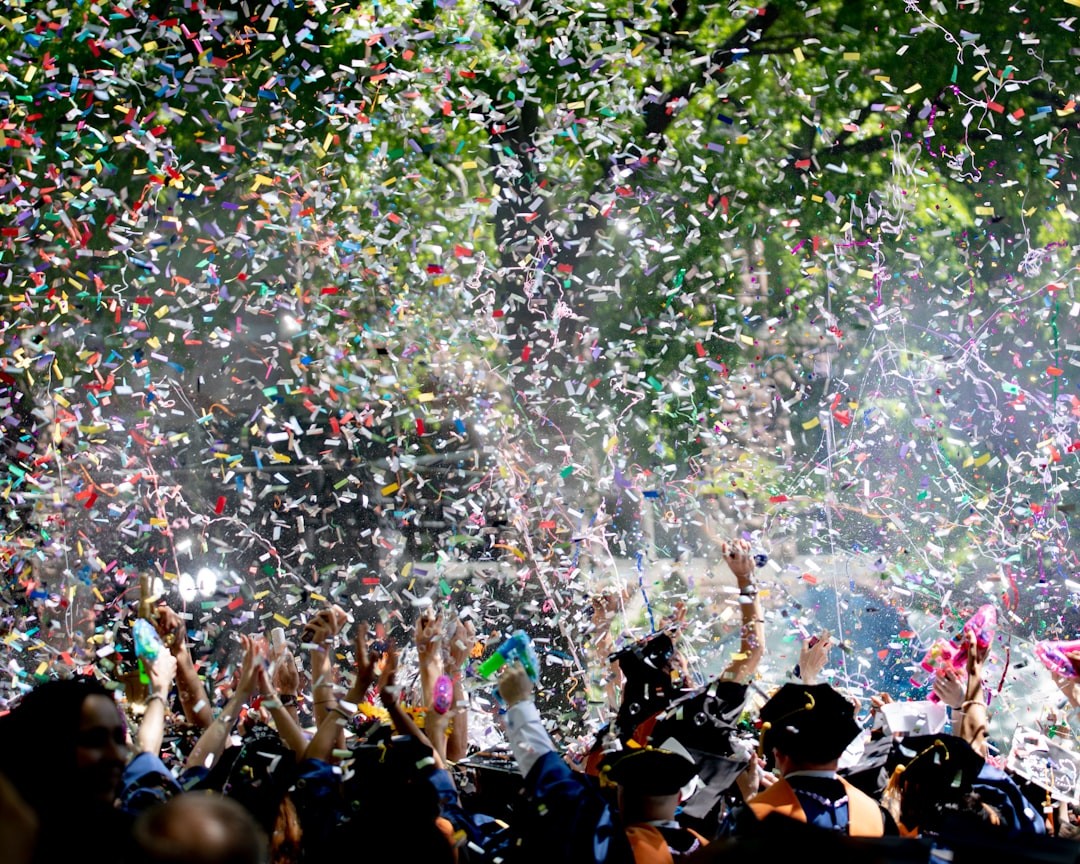 people covered by confetti